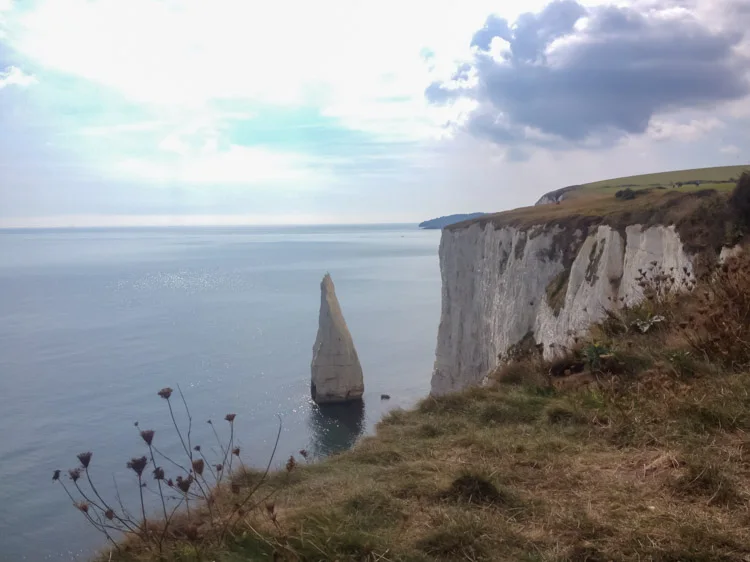 The Pinnacles sharp pointed stack close to the white chalk cliff