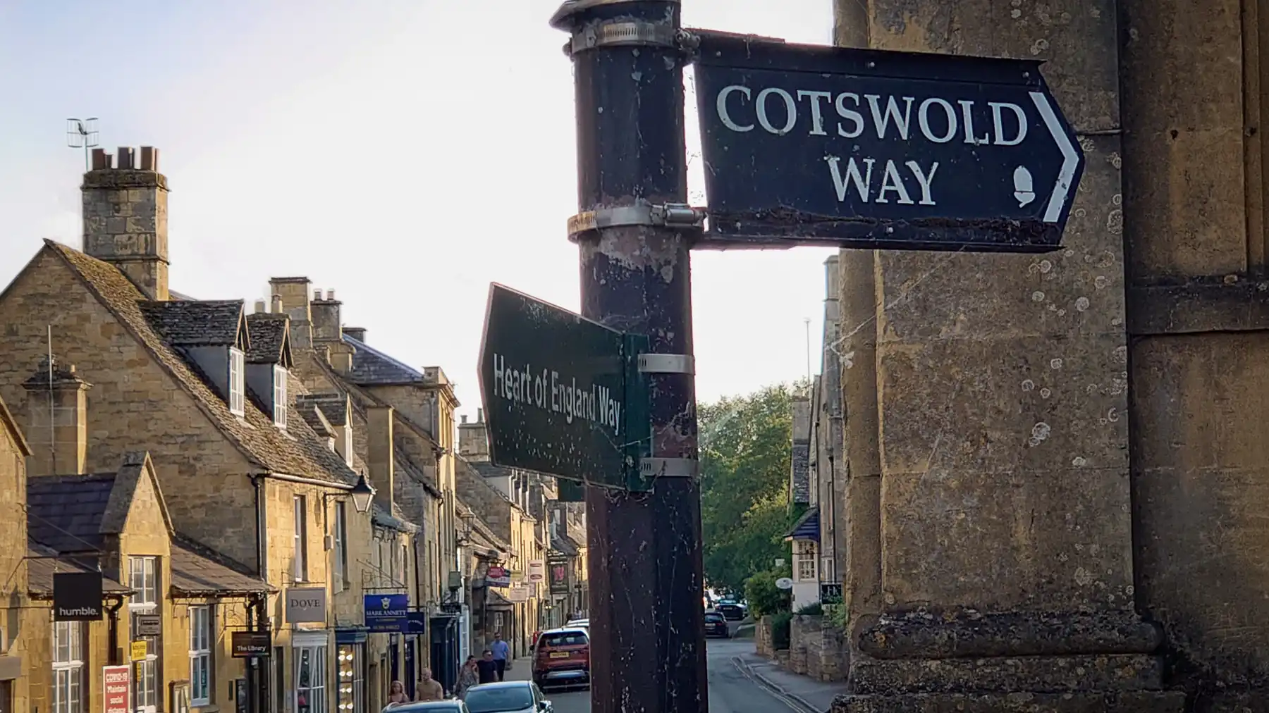 A Cotswold Way fingerpost in the honey-coloured town of Chipping Campden
